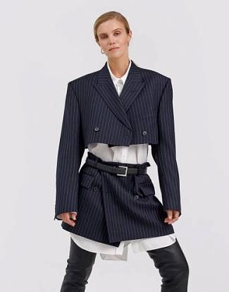 a woman wearing a suit